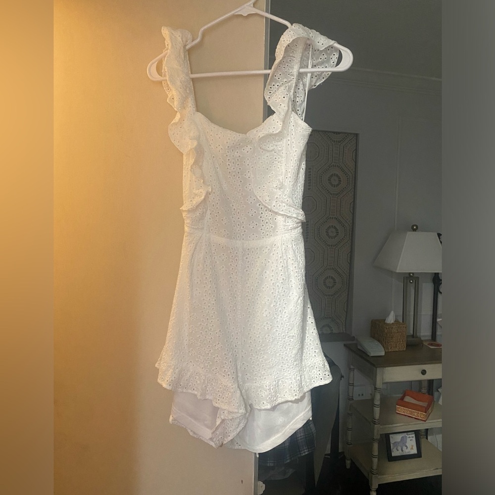 White romper with open back